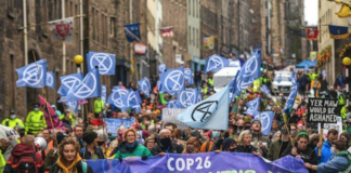 Extinction Rebellion protesters march through Edinburgh