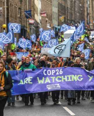 Extinction Rebellion protesters march through Edinburgh