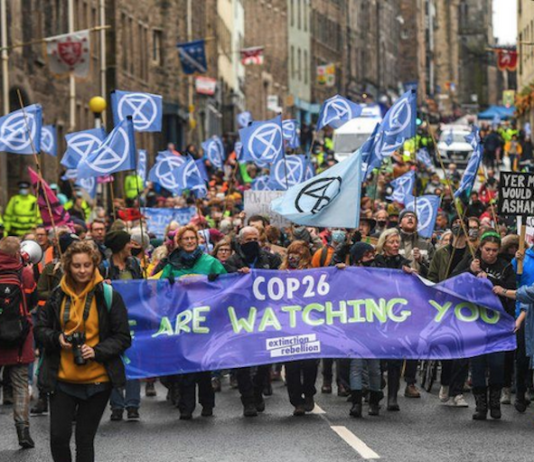 Extinction Rebellion protesters march through Edinburgh