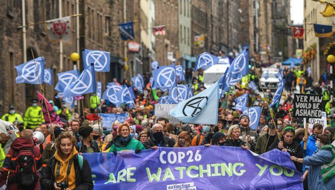 Extinction Rebellion protesters march through Edinburgh