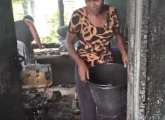 Cleaning up the gutted Kukum traffic police station