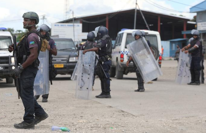 Armed Honiara police in action