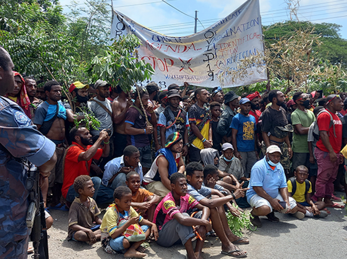 Anti-vaxxers gather for an illegal rally in the capital Port Moresby