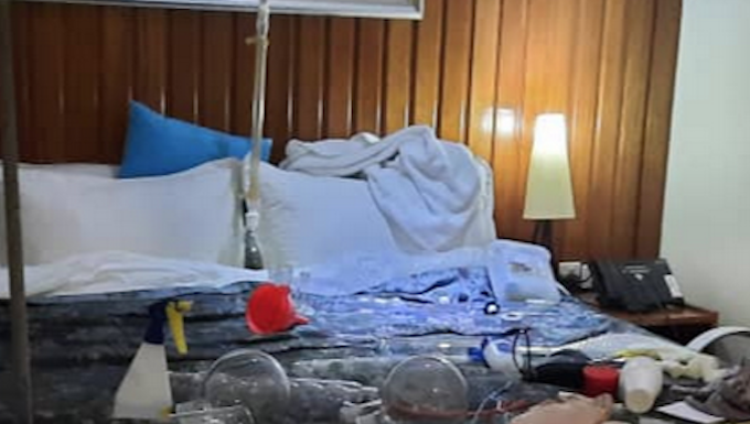 The hotel room lab raided by PNG police