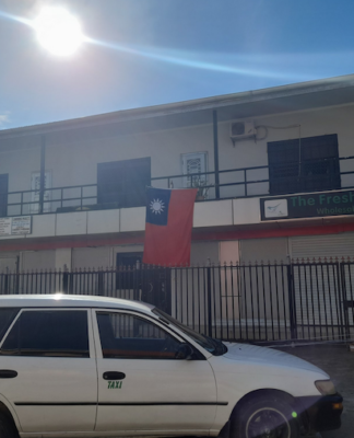 Solomon Islands: Bodies discovered in burnt out Chinatown building Taiwan flag in Honiara's Chinatown