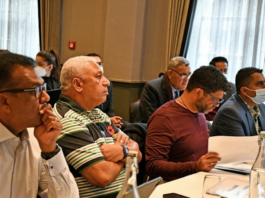 Fiji Prime Minister Voreqe Bainimarama being briefed at COP26