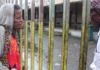 Woman at closed Malahang Health Centre