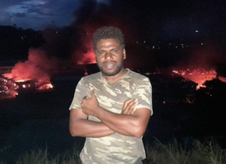 Job Rongo’au reporting on the Honiara riots for ZFM Radio
