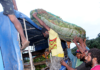 "Dignity" PMV crew loading a truck with produce