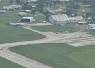 Fua'amotu International Airport coated in ash