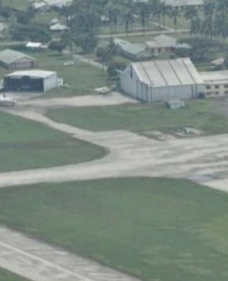 Fua'amotu International Airport coated in ash