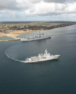 HMNZS Aotearoa (docked) and HMNZS Wellington in Nuku’alofa