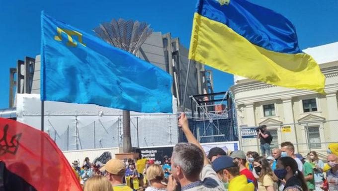 People in Wellington's Civic Square protest against Russia's invasion of Ukraine