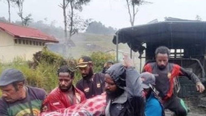 Wenda backs urgent UN call for action over Papuan child killings, disappearances Relatives carry body of a 12-year-old Papuan boy