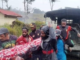 Relatives carry body of a 12-year-old Papuan boy