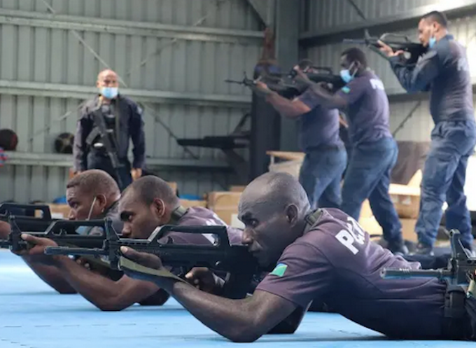 Solomon Islands police officers being trained by China