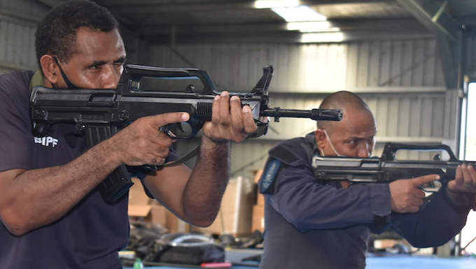 Royal Solomon Islands Police Force officers train with replica guns supplied by the Chinese government