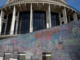 Wall graffiti chalked up by anti-mandates protesters