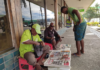 Newspaper street vendors in Honiara.