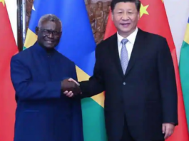 Solomon Islands' Prime Minister Manasseh Sogavare with Chinese President Xi Jinping