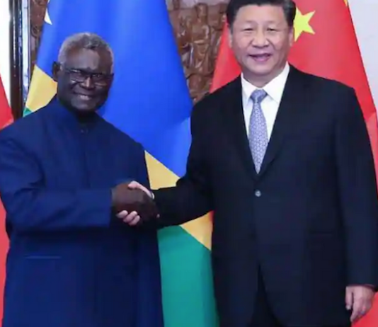Solomon Islands' Prime Minister Manasseh Sogavare with Chinese President Xi Jinping