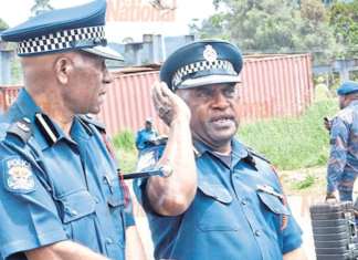 Southern Highlands commander Chief Inspector Daniel Yangen (left) with Assistant Commissioner (Western) John Kale in Mendi