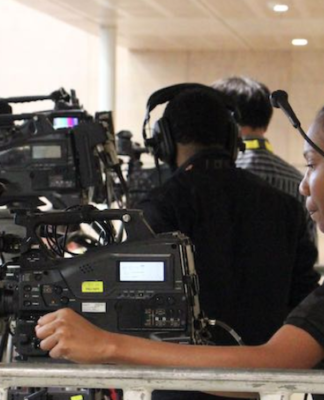 A media crew at gthe 2018 APEC leaders summit in Port Moresby