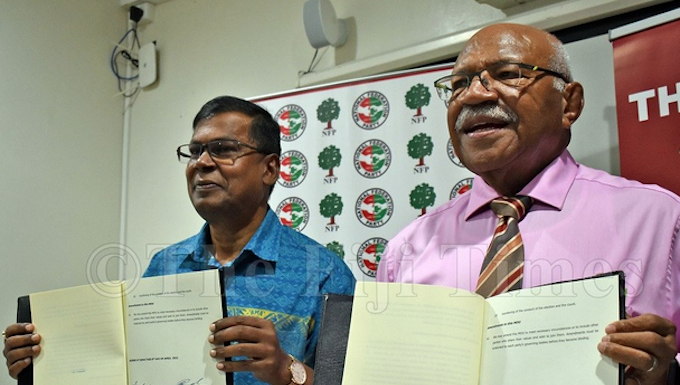 NFP's Biman Prasad (left) with People's Alliance leader Sitiveni Rabuka