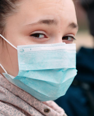 New Zealand's orange setting is relaxing mask requirements for schools