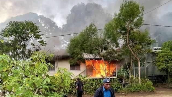 Post-Courier blasts Marape for Jakarta junket ‘while Tari burns’ Blazing house in the attack on Pai Police Barracks