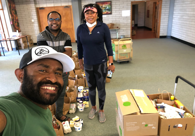 Papuan students in Auckland sort donated food