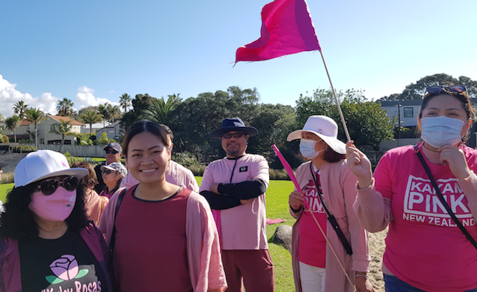 Nina Santos (second from left) with fellow Kakampink activists at Auckland's Campbells Park earlier this month