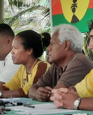 New Caledonia’s pro-independence parties choose for French elections Wali Wahetra (second left) and fellow election candidate Gerard Reignier (right)
