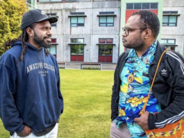 Laurens Ikinia (right) is advocating for a group of Papuan students