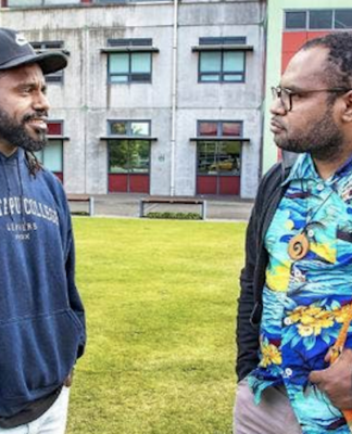 Laurens Ikinia (right) is advocating for a group of Papuan students