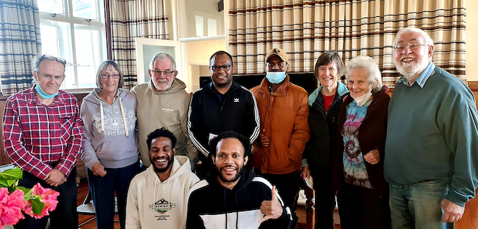 Papuan students meet Pax Christi members at the Friends' House in Mt Eden, Auckland. 