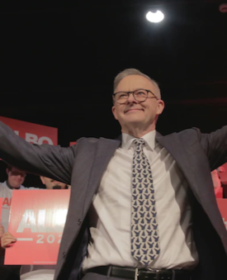 Australia's new Prime Minister Anthony Albanese with Strengthen Medicare placards
