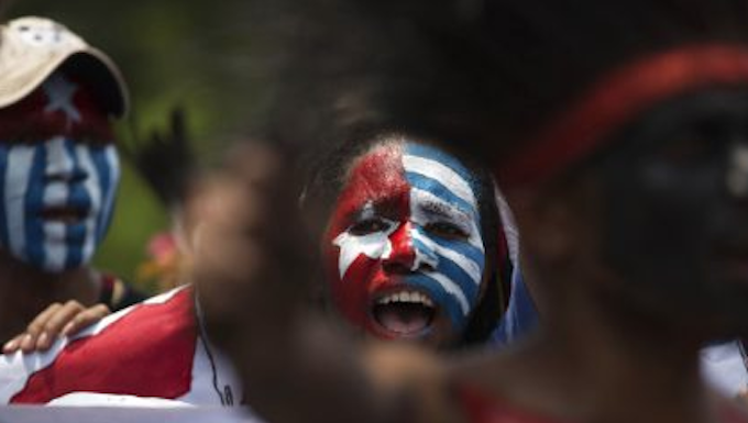 Indonesia’s new plans for Papua can’t hide its decades of failures Papuan students, with their body and face painted with the colours of the banned Morning Star flag