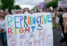 Abortion rights activists march on Constitution Avenue to the US Supreme Court in Washington, DC