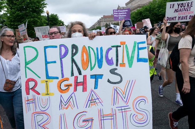 Abortion rights activists march on Constitution Avenue to the US Supreme Court in Washington, DC