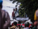 A Papuan protest in Jakarta with a banner reading "RIP Indonesian human rights"