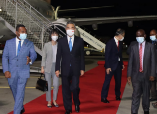 China's Foreign Minister Wang Yi (centre)