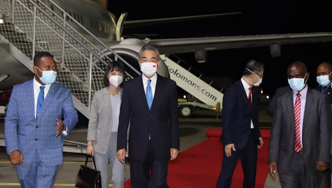 China's Foreign Minister Wang Yi (centre)