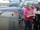 Polling officials check details from two ballot boxes arriving in Tari
