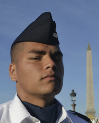 Matteo, a young Mā'ohi soldier from Tahiti, preparing for the annual Bastille Day parade in Paris.