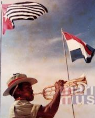 Raising the Morning Star flag of West Papuan independence alongside the flag of the colonial power The Netherlands in 1961