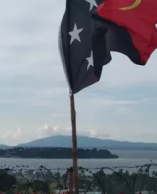 Titanic power struggle tipped for PNG’s ‘game changer’ election The PNG national flag - 2022 general election