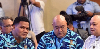 Tuvalu Foreign Minister Simon Kofe (left)