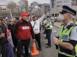 Police keep eye on the protest at NZ Parliament