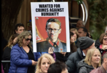 Dr Ashley Bloomfield lampooned at a conspiracy theorist rally